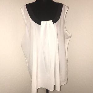 Sleeveless black and white blouse